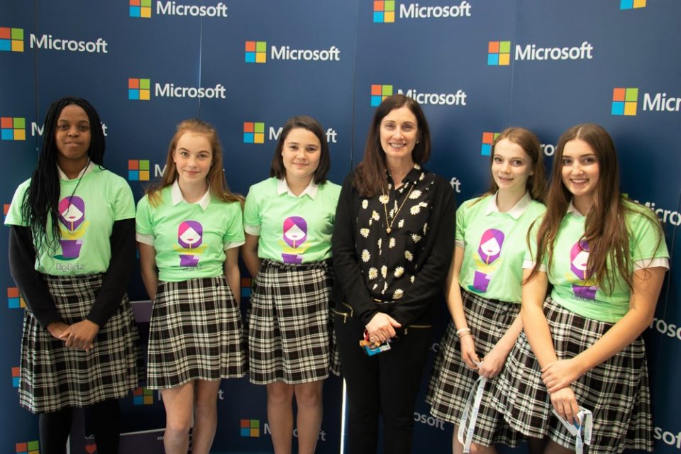Microsoft UK CEO Cindy Rose standing with a group of girls at the DigiGirlz event in Cambridge