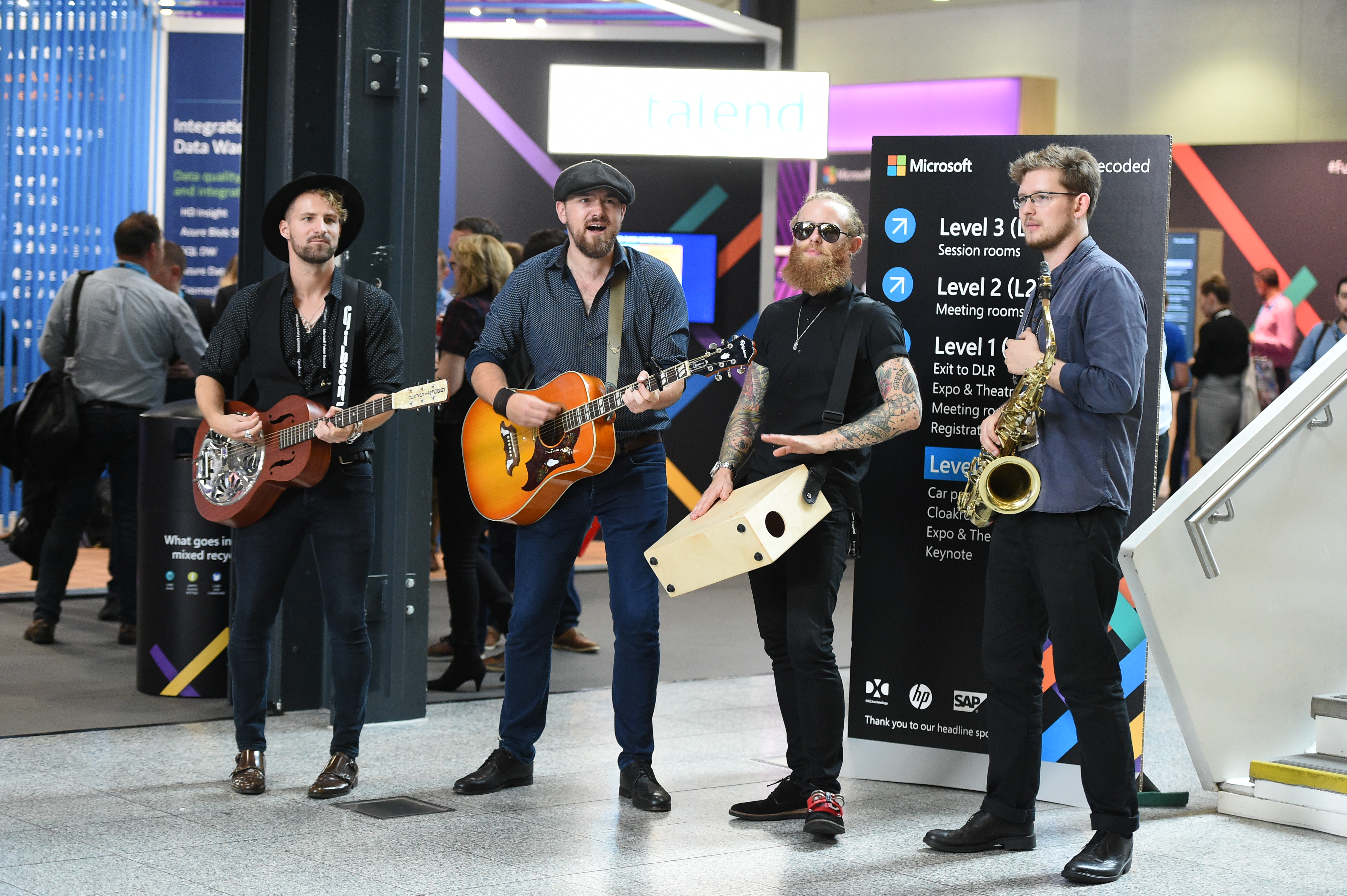 A band plays popular songs at Future Decoded