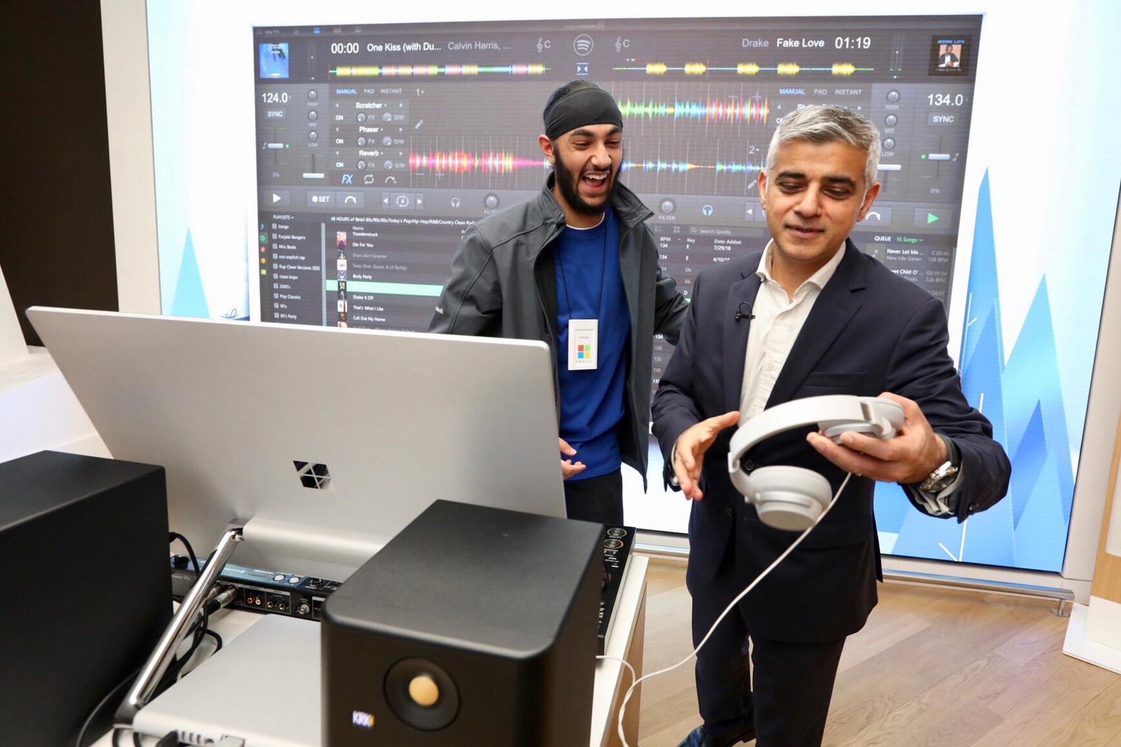 Mayor of London Sadiq Khan picks up Surface Headphones in the Microsoft London Store