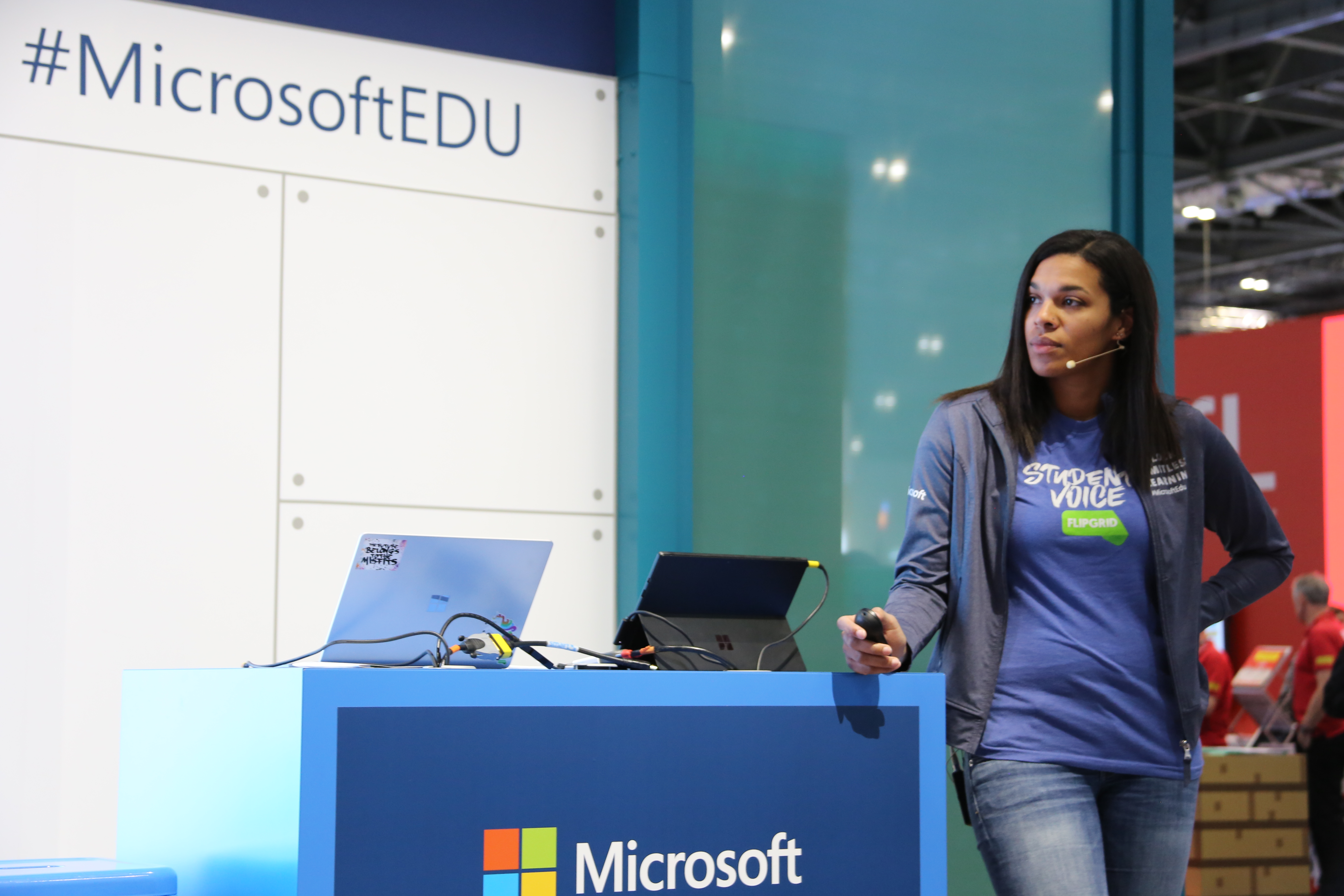 A woman gives a talk in Microsoft's area