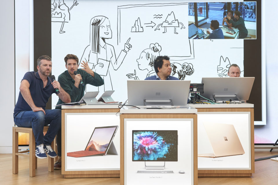 Greg James and Chris Smith (left) creating the story in the Microsoft Store, London