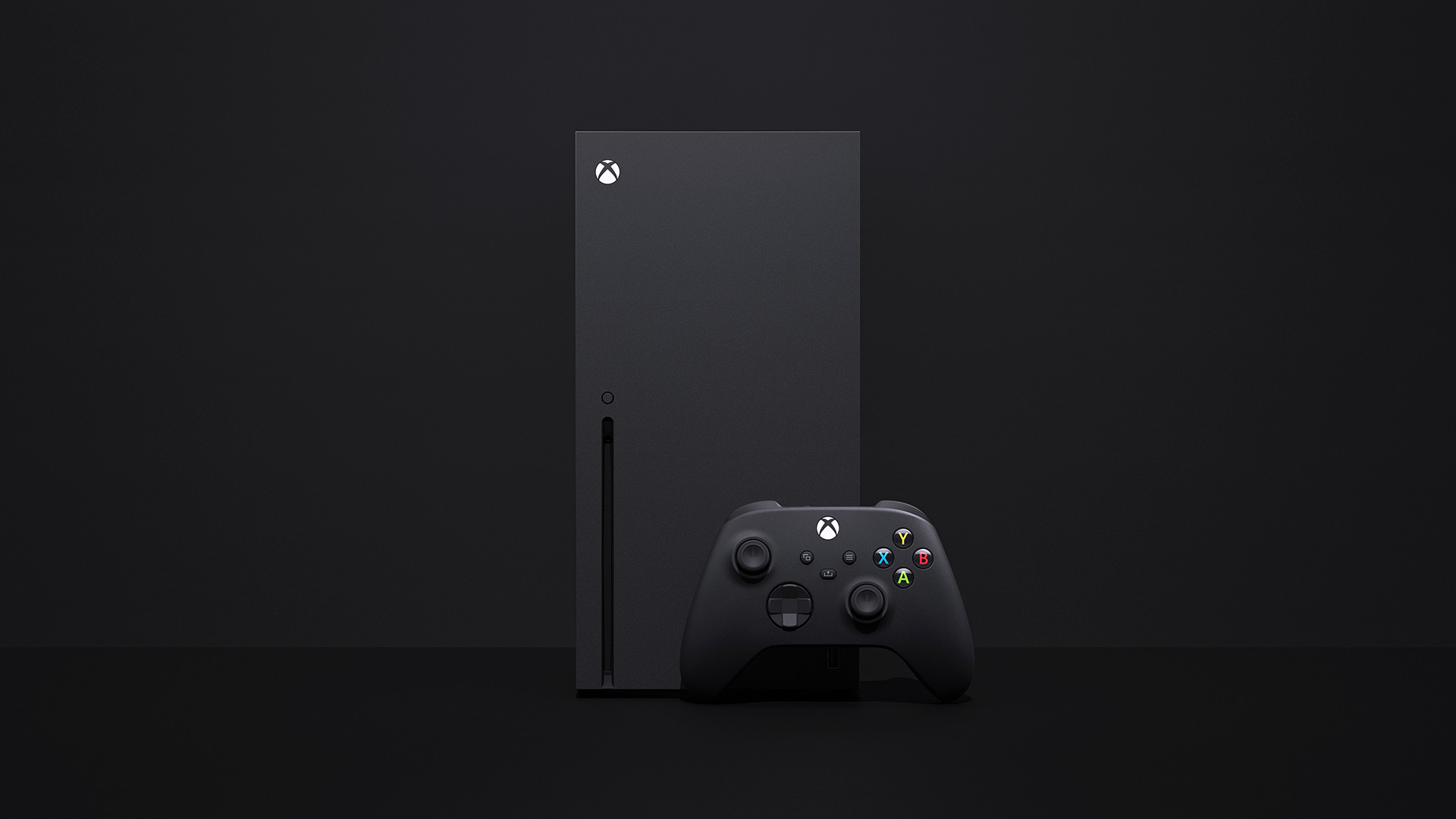 A black Xbox Series X and controller on a black background