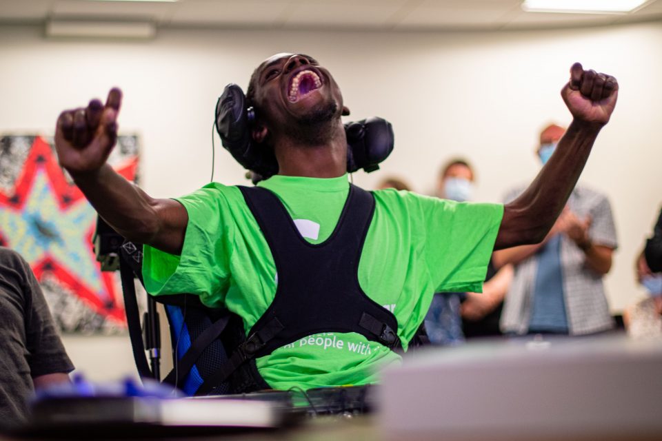 A National Star student celebrates while playing FIFA on an Xbox