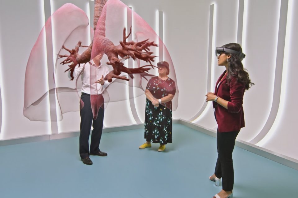 People wearing HoloLens looking at lungs