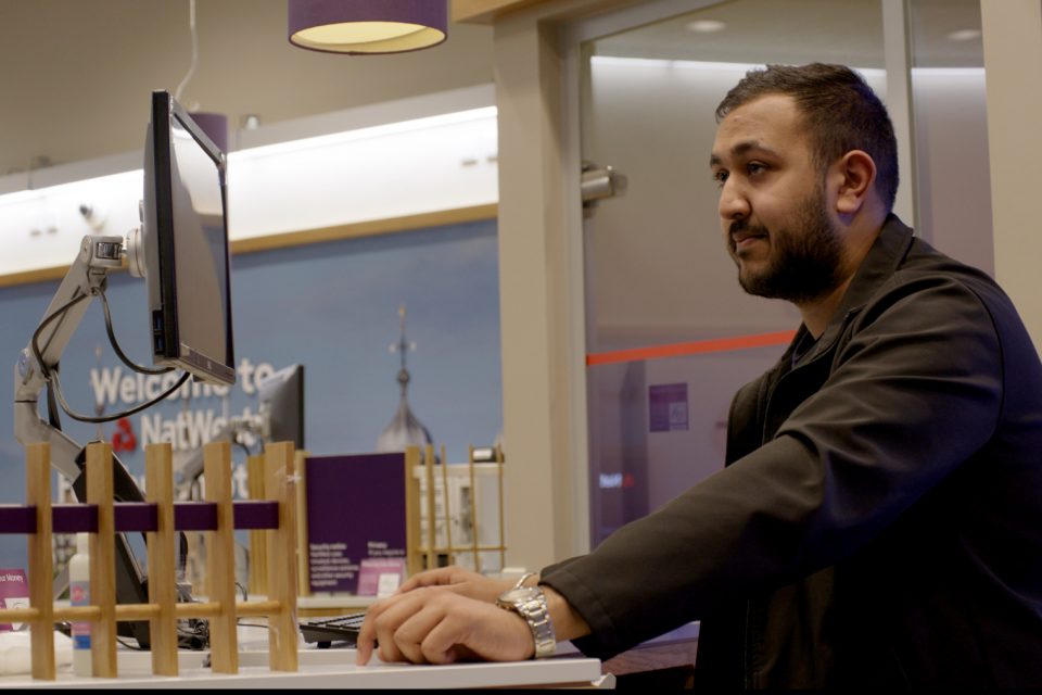 A NatWest colleague in one of the bank's branches