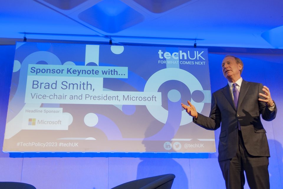 Microsoft President, Brad Smith, onstage at the techUK second annual Tech Policy Leadership Conference, giving a keynote speech