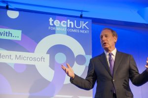 A close up of Microsoft President Brad Smith onstage at the techUK second annual Tech Policy event in London