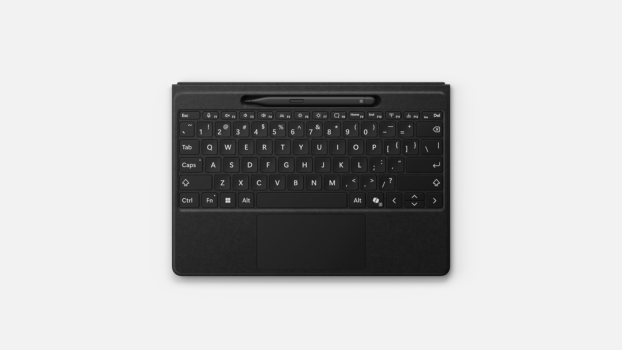 Birdseye view of a black Surface Pro Keyboard on a white background with a black Surface Pen included at the top.