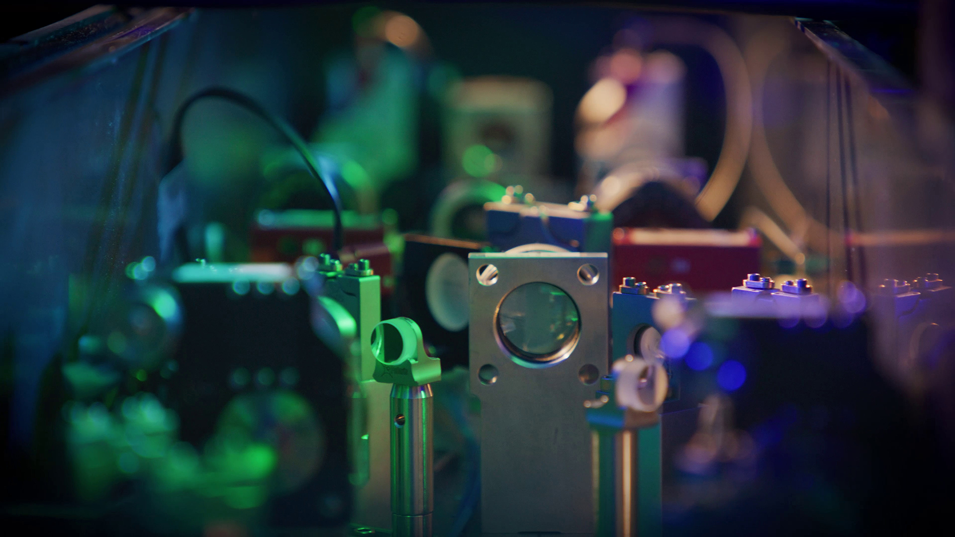 A close-up optics lab photograph from Atom Computing.