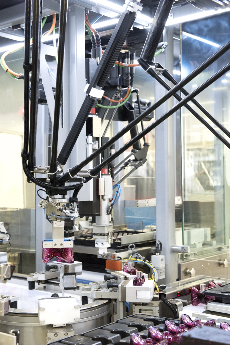 Robot on an agile packing line of Viktor & Rolf's Bonbon perfume, at the L'Oréal Lassignyplant, in France, in January 2018