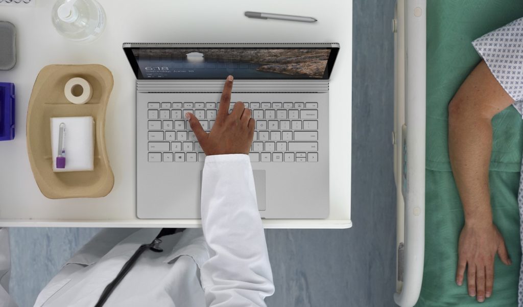 Overhead view of a Surface Book being used by a medical professional