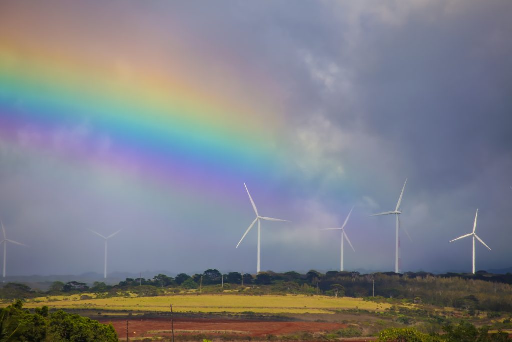 A rainbow over wind turbines on Oahu, Hawaii.