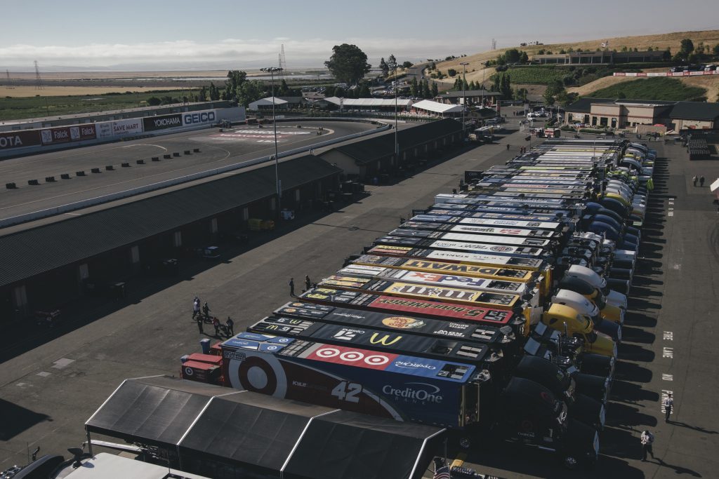 Haulers lined up at Sonoma Raceway carry the cars, parts, tools and NASCAR equipment from city to city. (Photo by Integrated Talent)