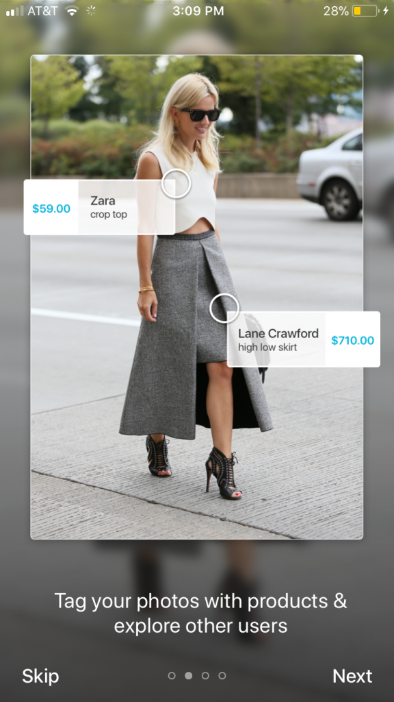A screenshot of a woman walking ni a top and skirt, with the items tagged via the COSIGN app.